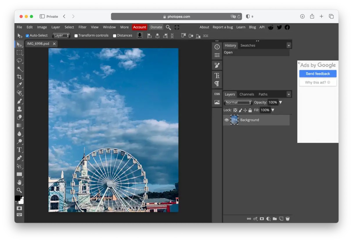 Рабочая область Photopea с панелью инструментов, слоями и фотографией
