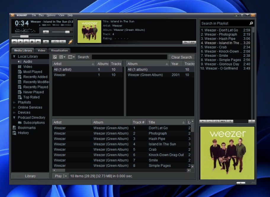 Winamp 5.9 в Windows 11 с открытой музыкальной библиотекой
