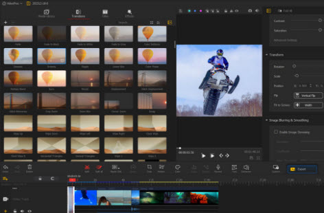 Интерфейс VideoProc Vlogger с библиотекой переходов и клипами на временной шкале